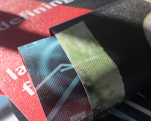 Close-up of printed mesh banner material samples