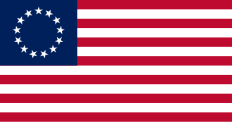 Flag with red and white stripes and a blue canton featuring a white star pattern.