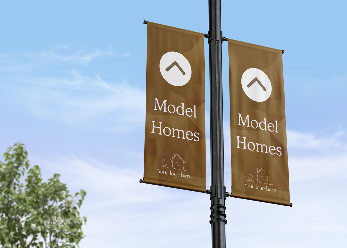 Double Lamp Post banner wayfinding residential development showing the direction of the model home or show home