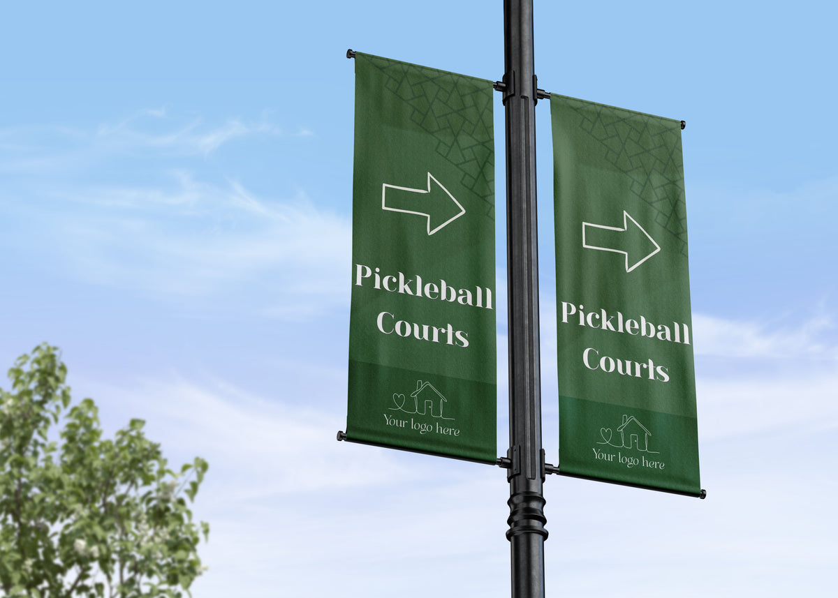 Double Lamp Post banner wayfinding residential development showing the direction of the neighborhood amenities such as pickleball or tennis courts