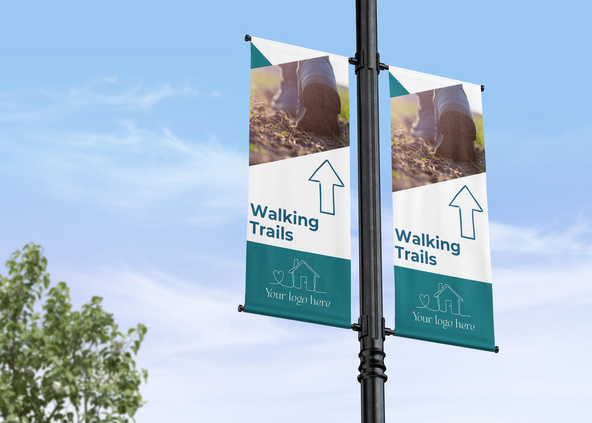 Double Lamp Post banner wayfinding residential development showing the direction of the neighborhood amenities like walking trails