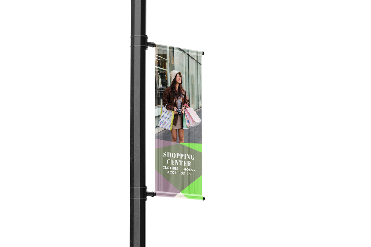 Street banner with a woman holding shopping bags on a pole against a white background - Geometrical Spring banner with lifestyle image